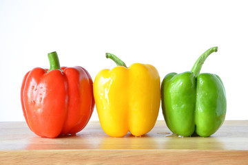 sweet peppers in red, yellow and green color