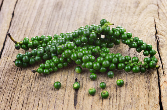 pepper sheeds on a wooden background