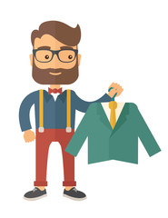 Happy young man chooses a perfect clothe.