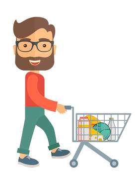 Male Shopper Pushing a Shopping Cart.
