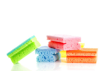 Stack of Colorful Cleaning Sponges on White Backgorund