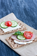 crisp bread with cheese and smoked turkey meat