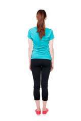 Fototapeta premium back view of standing young beautiful woman