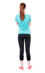 back view of standing young beautiful  woman