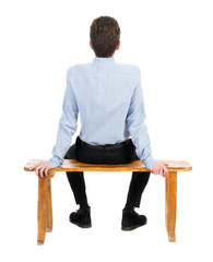 back view of business man sitting on chair.