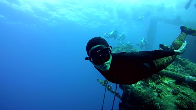 Freediver dives on the wreck Giannis D, Red Sea 
