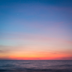 Naklejka na ściany i meble Sunset in the ocean