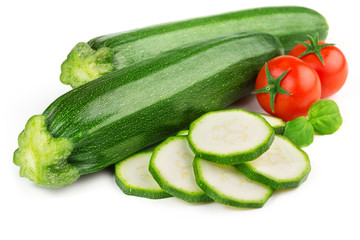 zucchini, cherry tomatoes and basil on white background