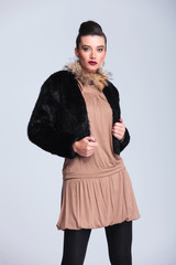 Beautiful young fashion woman posing