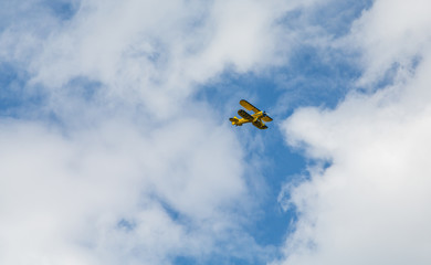 Yellow Biplane Advertising Rides