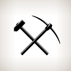 Silhouette of a Crossed Pickaxe and Sledgehammer