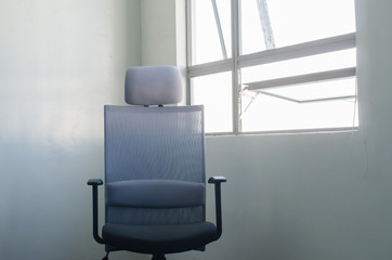 office chair by the window