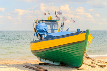 Fishing boat on the coast at Sopot at Baltic sea. 