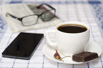Coffee with chilli, chocolate and phone
