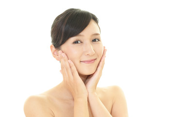 Fototapeta premium スキンケアをする女性