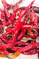 dried red chili pepper on wooden background