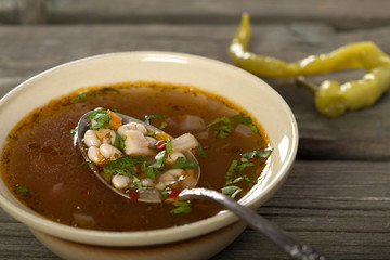 Bean soup in rustic bowl