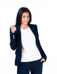 Businesswoman showing thumb up sign