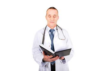 Mature male doctor holding notebook