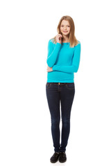 Fototapeta premium Young woman standing with toothy smile