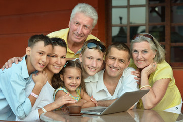 family  with laptop