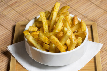 French fries served in white bowl