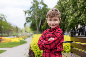 happy little boy in the red shirt