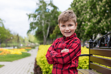 happy little boy in the red shirt