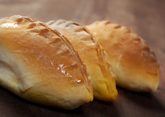 pierogi .Home cake with jam against