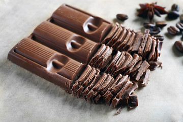 Chopped chocolate on parchment, closeup
