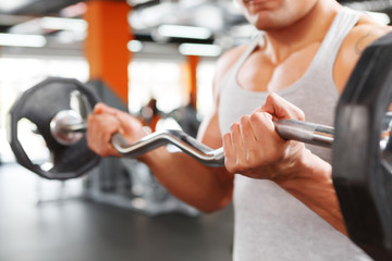 Close up of weightlifter with barbell