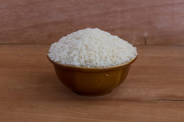 White long rice background, uncooked raw cereals, macro closeup