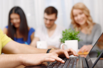 Team of developers making notes and discussing the project 