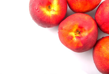 Nectarine fruits over white background