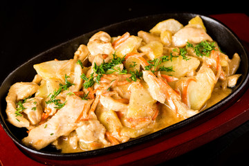 Tasty meat with fries
