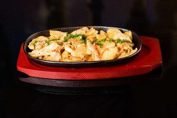 Tasty meat with potatoes