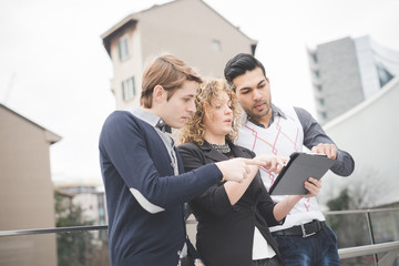 Multiracial business people working outdoor in town