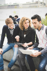 Multiracial business people working outdoor in town