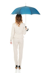 Businesswoman holding an umbrella.