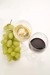 Fotobehang Glasses of wine and grapes © ugljesaras