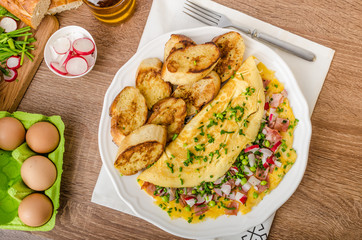 Omelette with spring vegetables and bacon