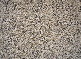 The texture of the walls of small pebbles