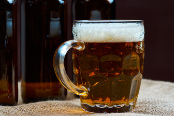 Glass and bottles of beer