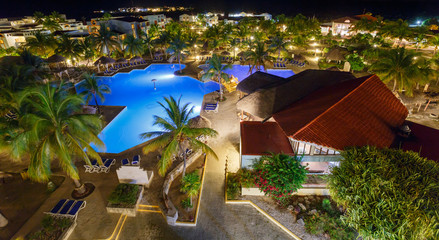 View on hotel and swimming pool at night