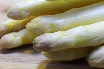 mature white asparagus tips for sale from greengrocers in spring