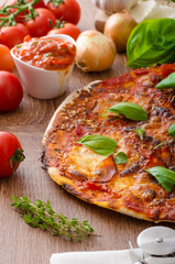 Cheese pizza with chilli and basil