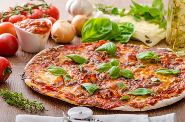 Cheese pizza with chilli and basil