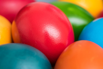 Fototapeta na wymiar Colorful Easter Eggs In Basket Close Up