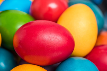 Fototapeta na wymiar Colorful Easter Eggs In Basket Close Up