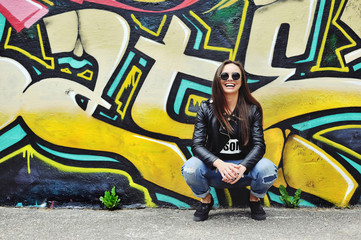 Beautiful hipster girl in glasses outdoor fashion portrait